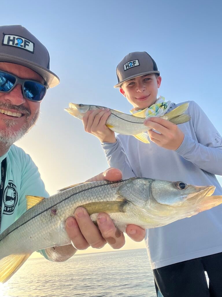 Jimmy and John Hurff fishing